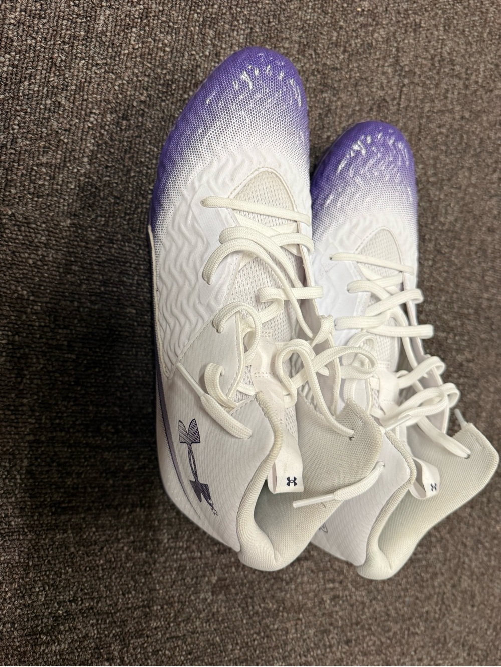 Under Armour White and Purple men’s Athletic Cleats